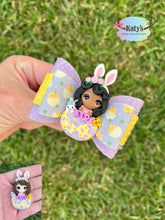 Load image into Gallery viewer, Purple Yellow Egg Girl mini clay bow
