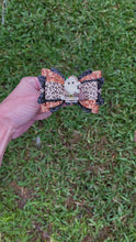 Load and play video in Gallery viewer, Leopard Santa clay bow
