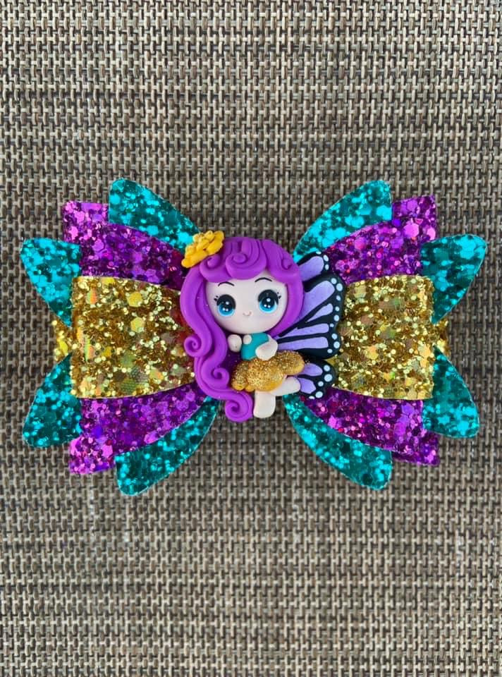 Teal Purple Butterfly Girl clay bow