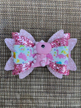 Load image into Gallery viewer, Pink Dinosaur clay bow
