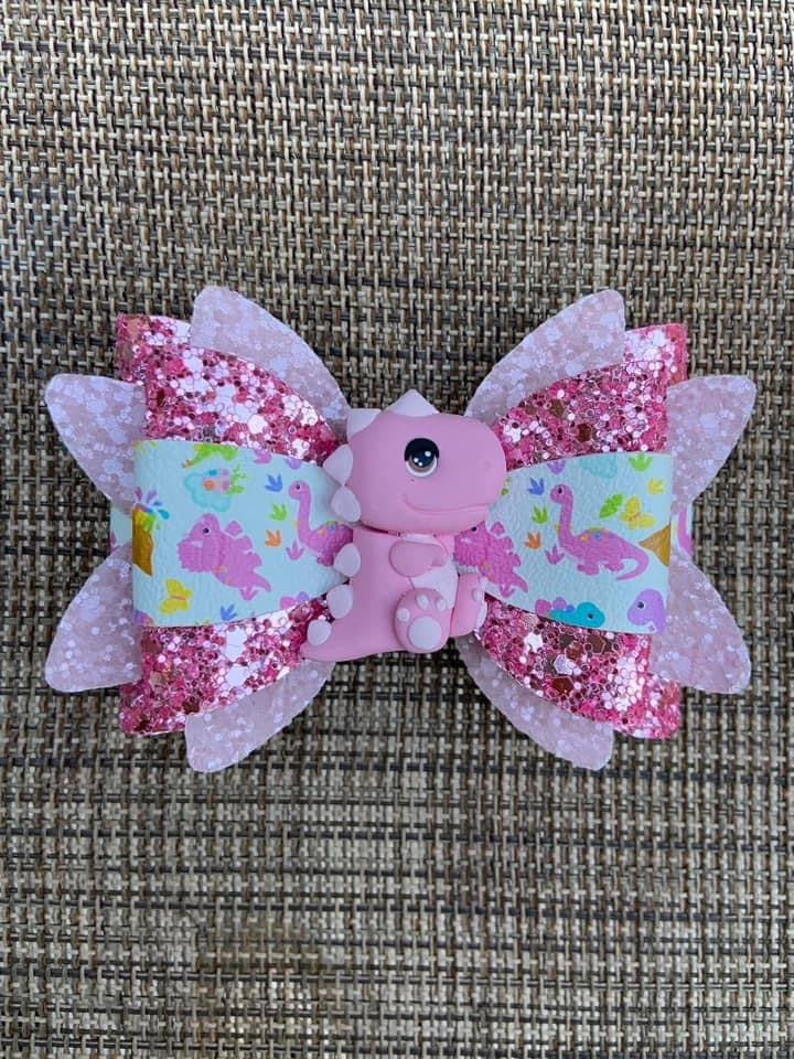 Pink Dinosaur clay bow